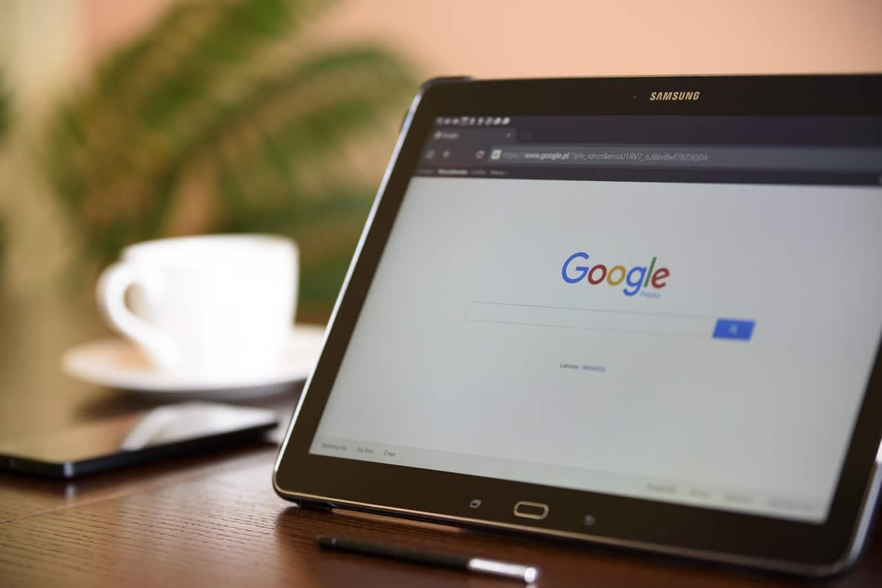Search engine optimization, digital marketing, Google search, online marketing strategies, SEO tools on tablet screen.